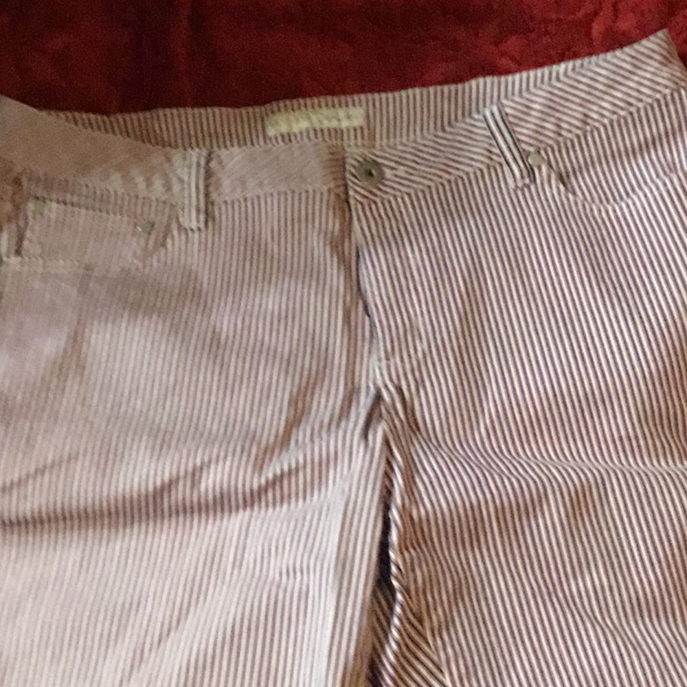 Striped lavender in color. 16w and are capri pants. Smoke free home.